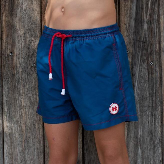 "Solid Rock" Swim Trunks (Boys) : Blue - Front View | Syd & Rex