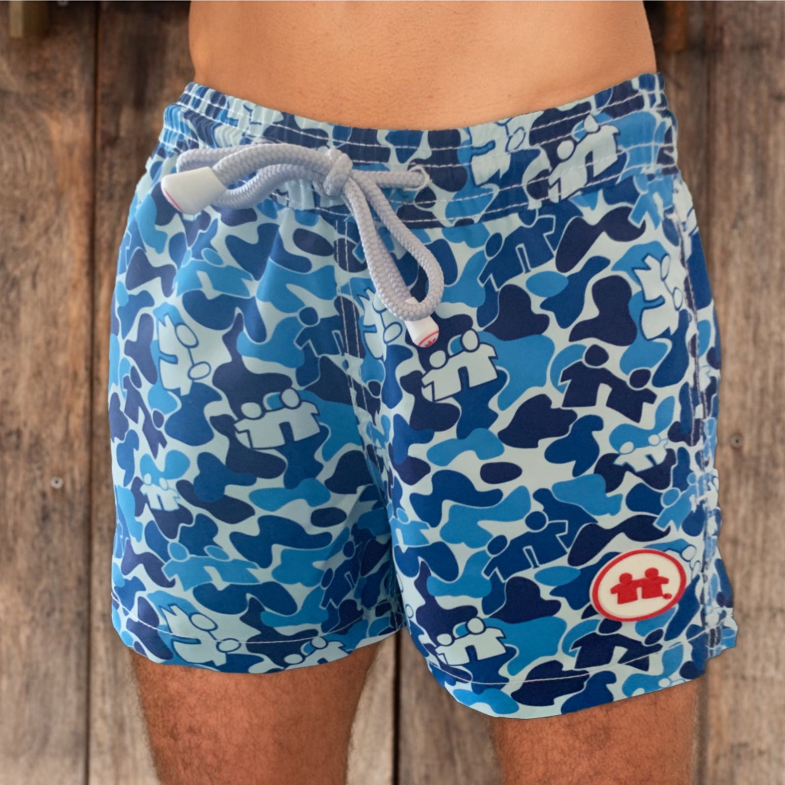 Syd & Rex Brotherhood Camo men's premium swim trunks in Blue — front view, made from SeaQual ocean plastic