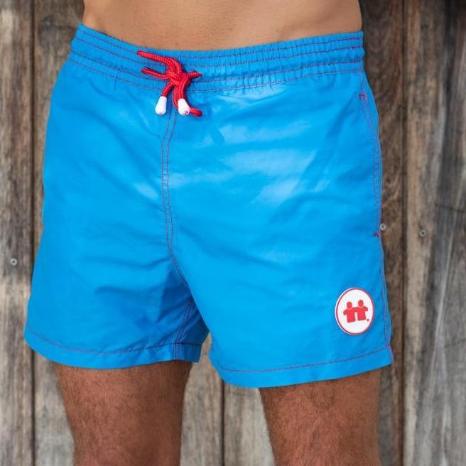 Syd & Rex Solid Rock men's premium swim trunks in Royal — front view, made from SeaQual ocean plastic
