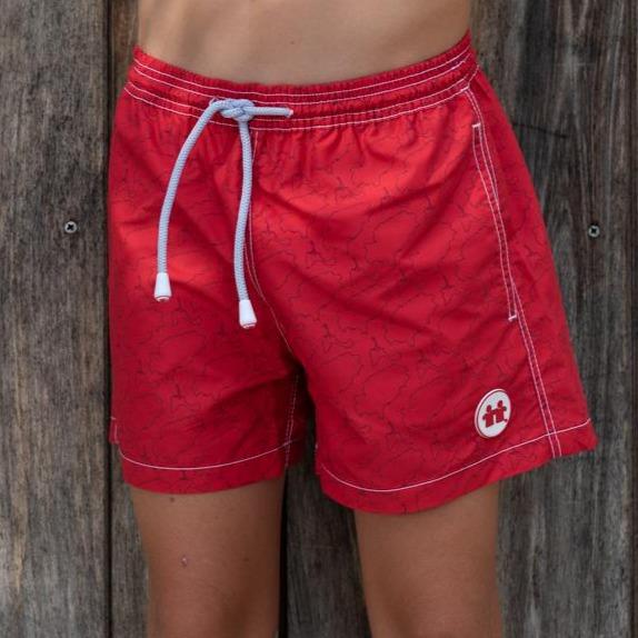 Syd & Rex Island Lines boys' premium swim trunks in Red/Blue — front view, made from SeaQual ocean plastic