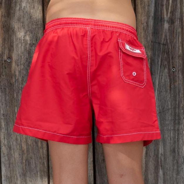 Syd & Rex Solid Rock boys' swim trunks in Red — back view showing print detail